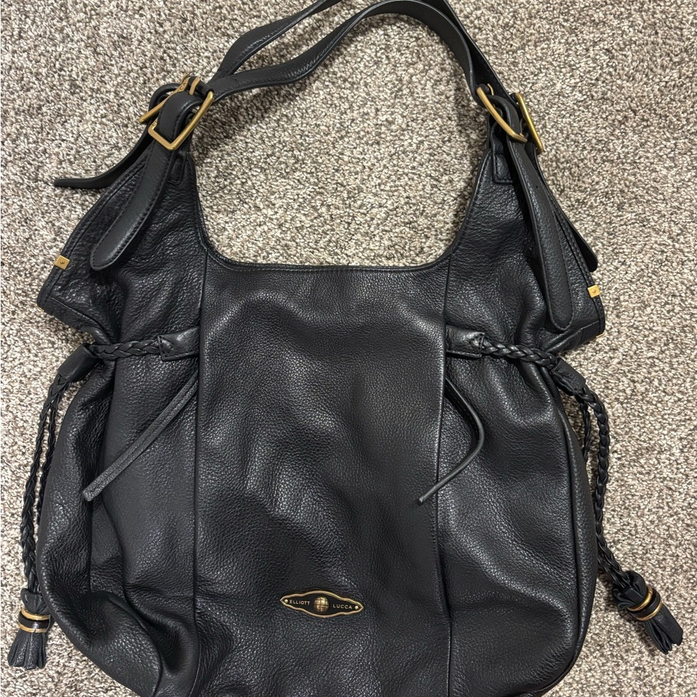 Luxurious Black Leather Shoulder Bag with Gold Accents